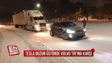 Tesla buzun üstünde Volvo TIR'ına karşı