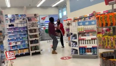 Markette maskesiz dolaşan kadın market çalışanına saldırdı