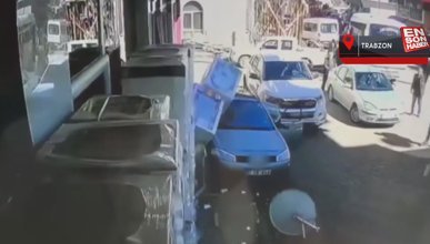 Trabzon'da el freni çekilmeyen araç, buzdolabı dükkanına girdi