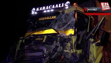 Kocaeli'de 2 kamyon çarpıştı, araçta sıkışan sürücü yaralandı
