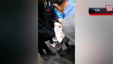 Çin’de koronavirüs testi olmayan kadın sokak ortasında doğum yaptı