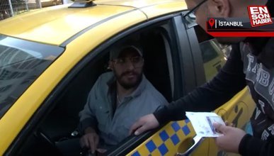 İstanbul'da denetime ağzında sigarayla yakalanan taksiciye ceza