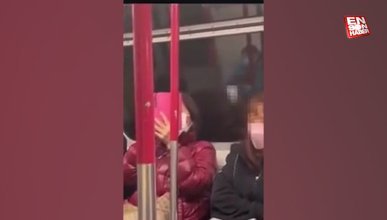 Metroda cinsel içerikli film izleyen kadın