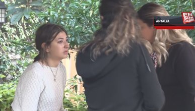 Antalya'da kedisi yangında telef olan genç kız gözyaşlarına boğuldu
