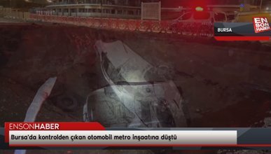 Bursa'da kontrolden çıkan otomobil metro inşaatına düştü