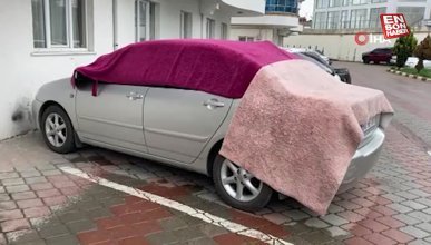 Sağanak yağış uyarısı yapılan Kastamonu'da araçlara battaniye ve halılı koruma