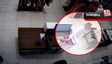 Gaziosmanpaşa'da kadın hırsızın kasadaki telefonu çaldığı anlar kamerada