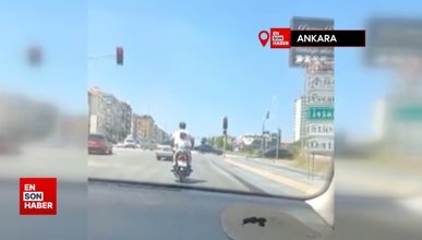 Ankara'da minik kızın motosikletle tehlikeli yolcuğu kamerada