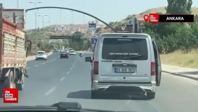 Ankara’da sıcaktan bunalan sürücü, aracının kapısını açarak seyahat etti