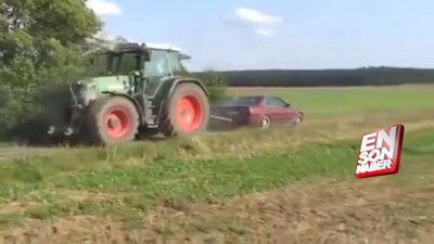 Otomobile traktör çektirdiler