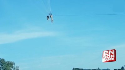 Tayland'da emniyetsiz parasiling yapan maceracılar