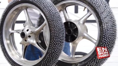 Motosiklet lastiğini vidalarla kar lastiğine çevirdi