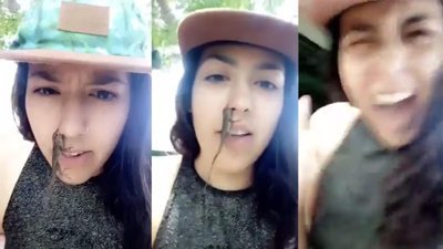 Burnunu kerkentele ısıran kız