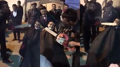 Motorlu testere ile damat traşı