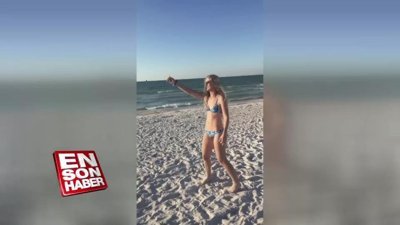 Martılara yem vermek isterken yem olan kadın