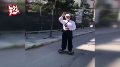Yaşlı adamın hoverboard keyfi