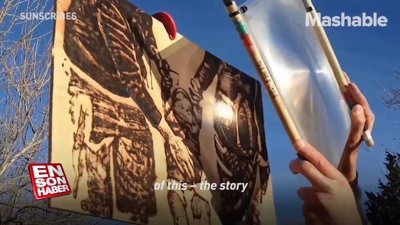 Güneş ışığını resim yapmak için kullanan sanatçı