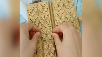 Origami sanatıyla yapılan defterden kutu