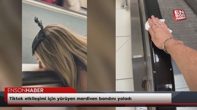 Tiktok etkileşimi için yürüyen merdiven bandını yaladı