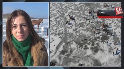 Çıldır Gölü buz tuttu, ziyaretçiler akın etti