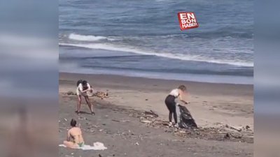 Çöp toplayıp fotoğraf çektirdi: İşi bitince sahili kirleterek geri döndü