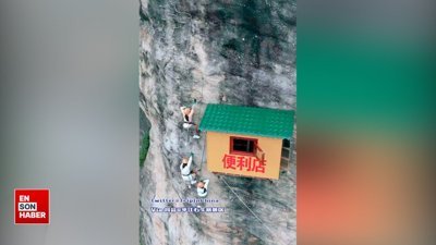 Dağcılar için 100 metre yüksekliğe tezgah açan Çinli