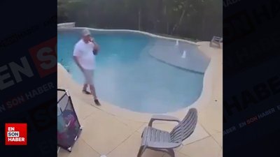 Havuza düşüp hiçbir şey olmamış gibi telefonla konuşmaya devam etti
