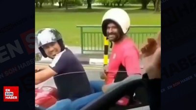 Kaskını ters takan adam