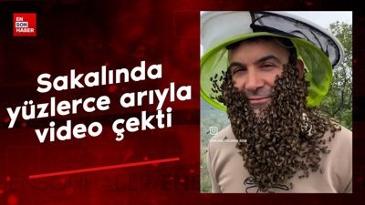 Arıcı, sakalında yüzlerce arıyla video çekti