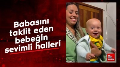 Babasını taklit eden bebeğin sevimli halleri