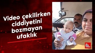 Video çekilirken ciddiyetini bozmayan ufaklık