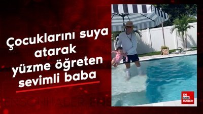 Çocuklarını suya atarak yüzme öğreten sevimli baba