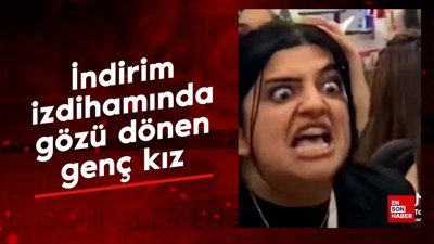 İndirim izdihamında gözü dönen genç kız