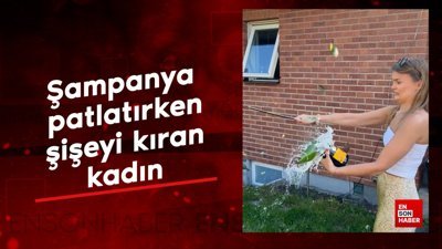 Şampanya patlatırken şişeyi kıran kadın