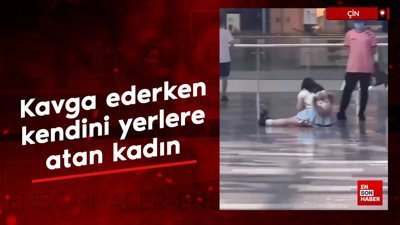 Erkek arkadaşıyla kavga ederken kendini yerlere atan kadın