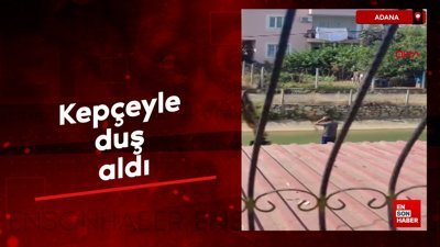 Adana'da kepçeyle duş aldı
