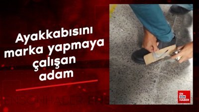Ayakkabısını marka yapmaya çalışan adam