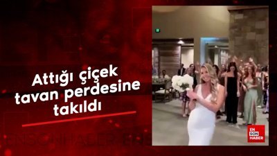 Attığı çiçek tavan perdesine takıldı