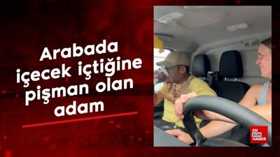 Arabada içecek içtiğine pişman olan adam