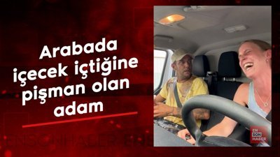 Arabada içecek içtiğine pişman olan adam