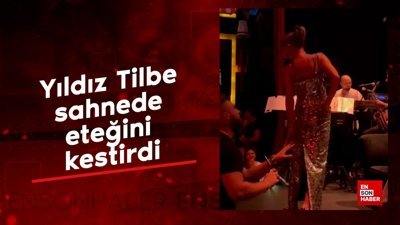 Yıldız Tilbe sahnede eteğini kestirdi