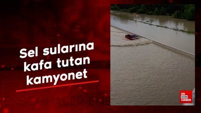 Sel sularına kafa tutan kamyonet