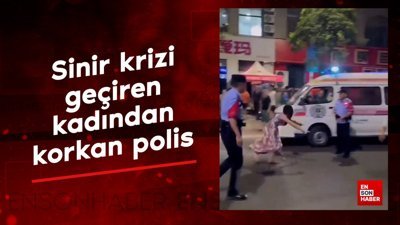 Sinir krizi geçiren kadından korkan polis