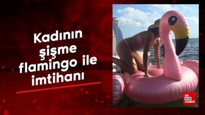 Kadının şişme flamingo ile imtihanı