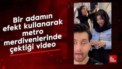 Bir adamın efekt kullanarak metro merdivenlerinde çektiği video