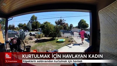 Köpeklerin saldırısından kurtulmak için havlayan kadın