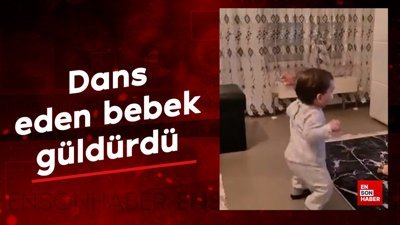 Dans figürlerini sergileyen bebek