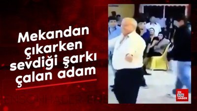 Mekandan çıkarken sevdiği şarkı çalan adam