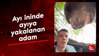 Ayı ininde ayıya yakalanan adam