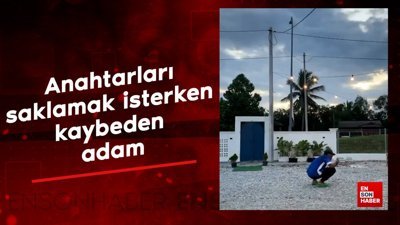 Anahtarları saklamak isterken kaybeden adam